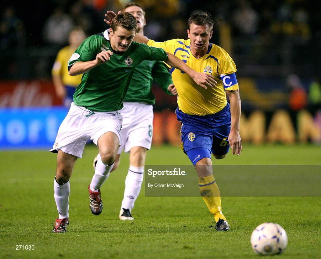 17 October 2007; George McCartney, Northern Ireland, in action against Anders Svensson, Sweden. 2008 European Championship Qualifier, Sweden v Northern Ireland, Rasunda Stadium, Solna, Stockholm, Sweden. Picture credit; Oliver McVeigh / SPORTSFILE