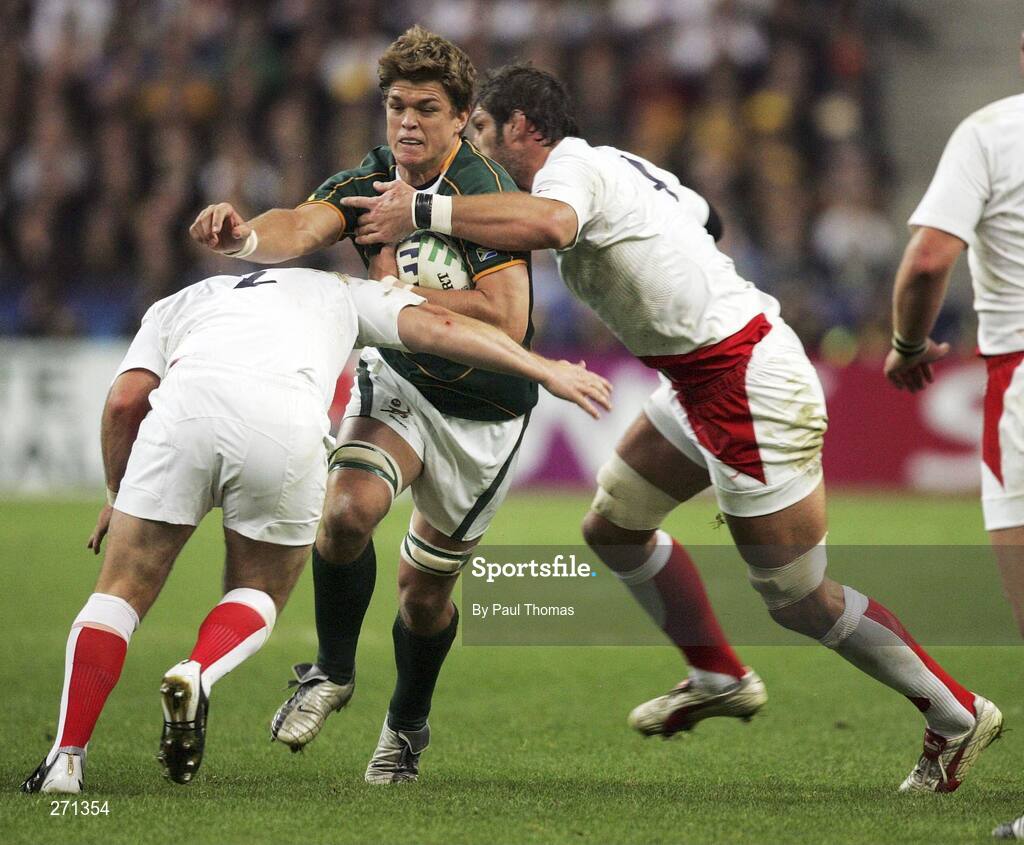 20 October 2007; Juan Smith, South Africa, is tackled by Mark Regan, left, and Simon Shaw, England, Rugby World Cup Final, South Africa v England,Stade de France, Paris. Picture credit; Paul Thomas / SPORTSFILE