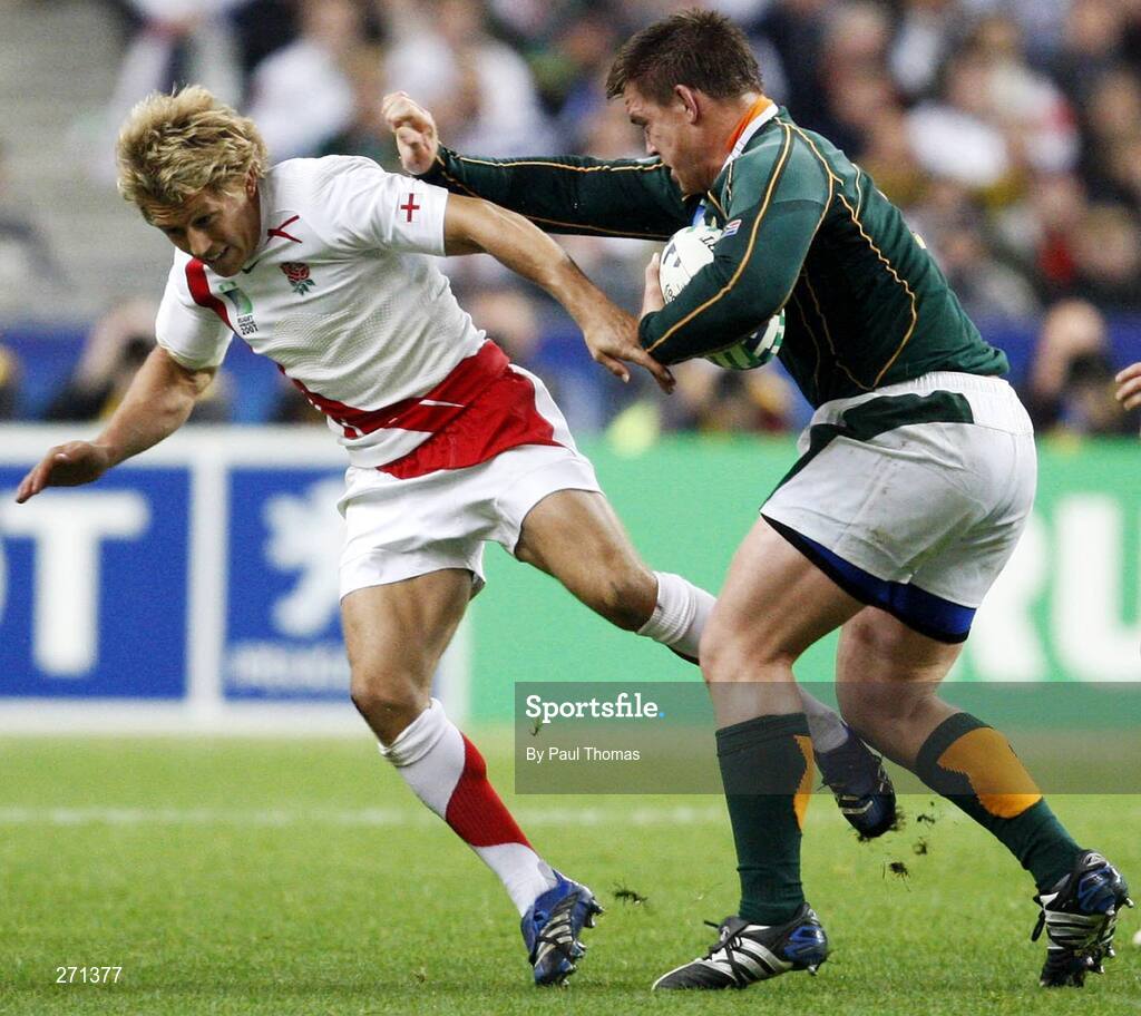 20 October 2007; England's Jonny Wilkinson is handed off by South Africa's John Smit. Rugby World Cup Final, South Africa v England,Stade de France, Paris. Picture credit; Paul Thomas / SPORTSFILE