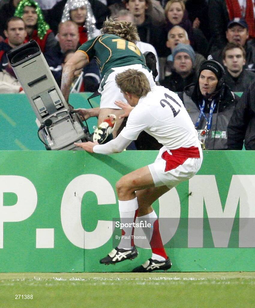 20 October 2007; South Africa's Percy Montgomery goes over into a tv camera. Rugby World Cup Final, South Africa v England,Stade de France, Paris. Picture credit; Paul Thomas / SPORTSFILE