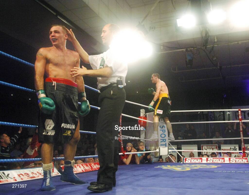 20 October 2007; Referee David Irvine stops the fight during the eight round, as Matthew Macklin, right, celebrates victory over Alessio Furlan. Hunky Dorys Fight Night, Matthew Macklin v Alessio Furlan, International Middleweight contest, National Stadium, Dublin. Picture credit; David Maher / SPORTSFILE
