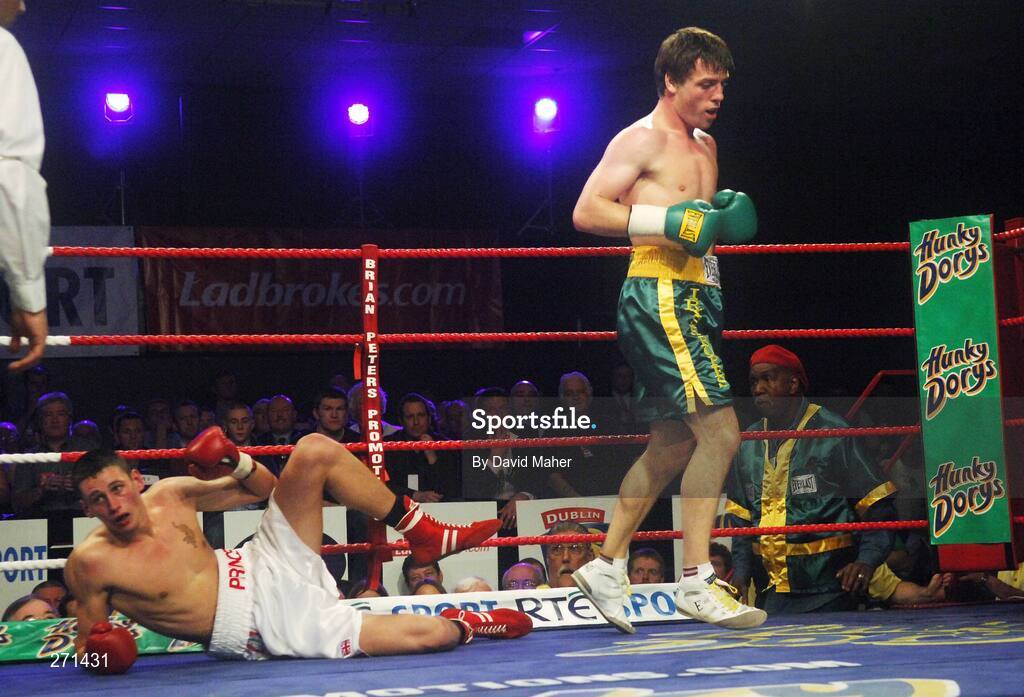 20 October 2007; John Duddy, right, puts Prince Arron down during the second round. Hunky Dorys Fight Night, John Duddy v Prince Arron. National Stadium, Dublin. Picture credit; David Maher / SPORTSFILE