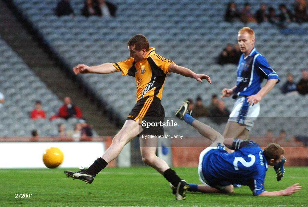 27 October 2007; Thomas Freeman, Ulster, shoots to score his sides first goal despite the efforts of Thomas O'Gorman, Munster. M. Donnelly Inter-Provincial Football Championships Final, Munster v Ulster, Croke Park, Dublin. Picture credit: Stephen McCarthy / SPORTSFILE