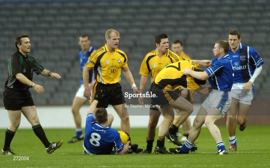 27 October 2007; Tomas O'Se, Munster, and Kevin Cassidy, Ulster, 7, tussel during the match as referee Maurcie Deegan and team-mates, from left, Darragh O'Se, Munster, 8, Dick Clerkin and Sean Cavanagh, Ulster, watch on. M. Donnelly Inter-Provincial Football Championships Final, Munster v Ulster, Croke Park, Dublin. Picture credit: Stephen McCarthy / SPORTSFILE