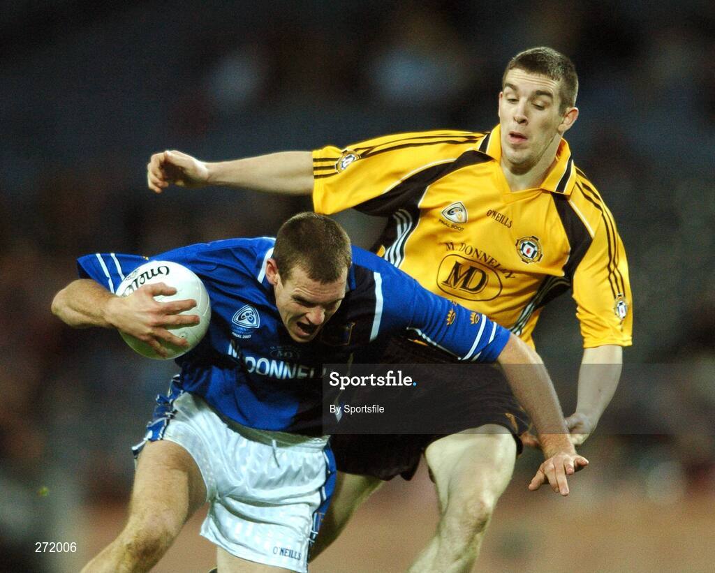 27 October 2007; Pierce O'Neill, Munster, in action against Barry Owens, Ulster. M. Donnelly Inter-Provincial Football Championships Final, Munster v Ulster, Croke Park, Dublin. Photo by Sportsfile