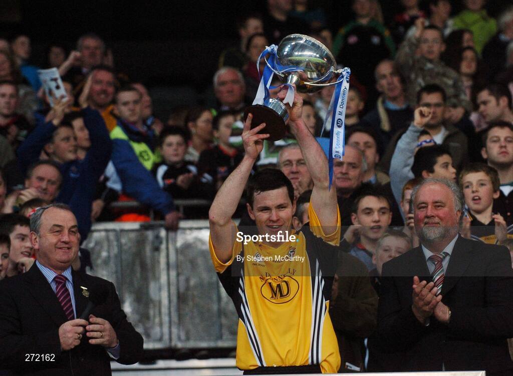 27 October 2007; Conor Gormley, Ulster, lifts the cup after the game as Nickey Brennan, GAA President, and sponsor Micheal Donnelly watch on. M. Donnelly Inter-Provincial Football Championships Final, Munster v Ulster, Croke Park, Dublin. Picture credit: Stephen McCarthy / SPORTSFILE