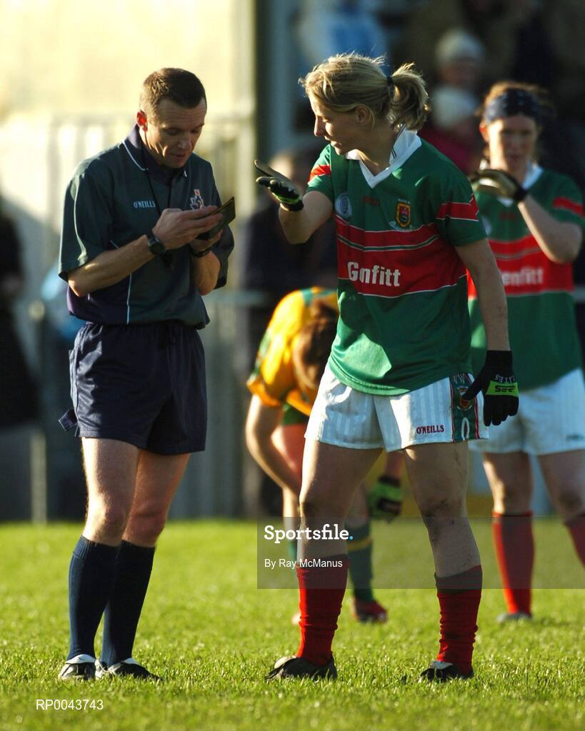 28 October 2007; Cora Staunton, Carnacon, Mayo, is booked by referee Michael Duffy before being shown a yellow card. VHI Healthcare Connacht Senior Club Football Championship Final, Corofin, Galway, v Carnacon, Mayo, Corofin, Galway. Picture credit: Ray McManus / SPORTSFILE