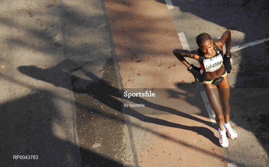29 October 2007; Women's 4th place Helilia Johannes from Namaibia after crossing the finish line in the adidas Dublin City Marathon 2007, Merrion Square, Dublin. Photo by Sportsfile  *** Local Caption ***