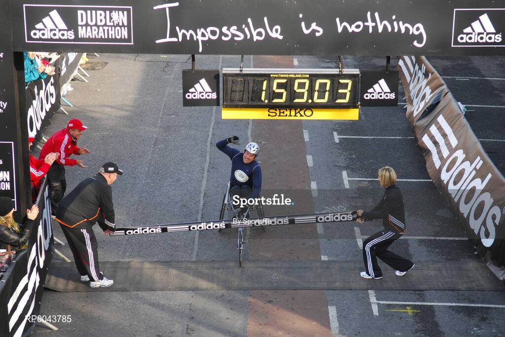 29 October 2007; The wheelchair 1st place winner Richie Powell from great Britan crosses the finish line in the adidas Dublin City Marathon 2007, Merrion Square, Dublin. Photo by Sportsfile  *** Local Caption ***