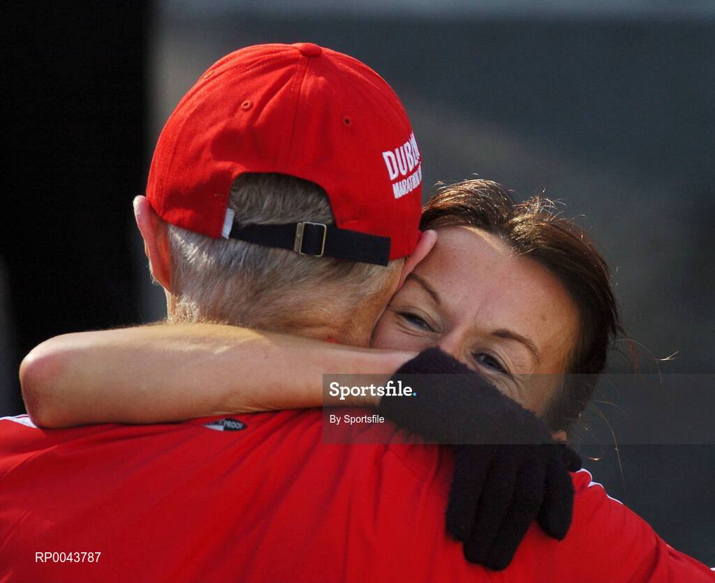 29 October 2007; 1st place women's Irish finisher Pauline Curley from Tullamore Harriers Athletic Club hugs race director Jim Aughney after she finished in the adidas Dublin City Marathon 2007, Merrion Square, Dublin. Photo by Sportsfile  *** Local Caption ***