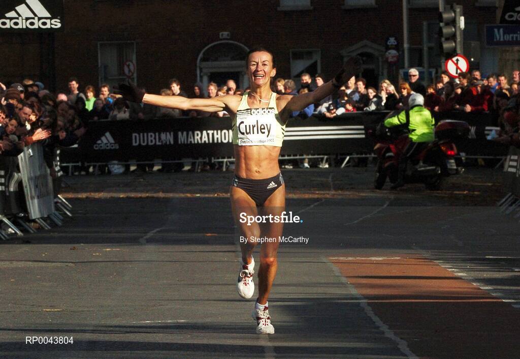 29 October 2007; Pauline Curley, from Tullamore Harriers, celebrates first Irish woman home during the adidas Dublin City Marathon 2007, Merrion Square, Dublin. Picture credit: Stephen McCarthy / SPORTSFILE