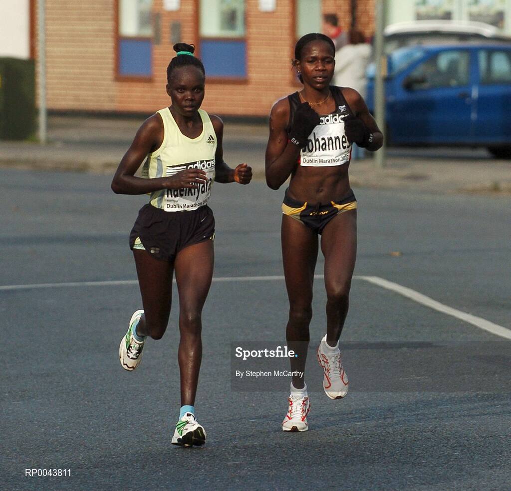 29 October 2007; Nguriatukei Raelkiyara, from Kenya, left, and Helalia Johanness, from Namibia, race through Crumlin during the adidas Dublin City Marathon 2007, Merrion Square, Dublin. Picture credit: Stephen McCarthy / SPORTSFILE