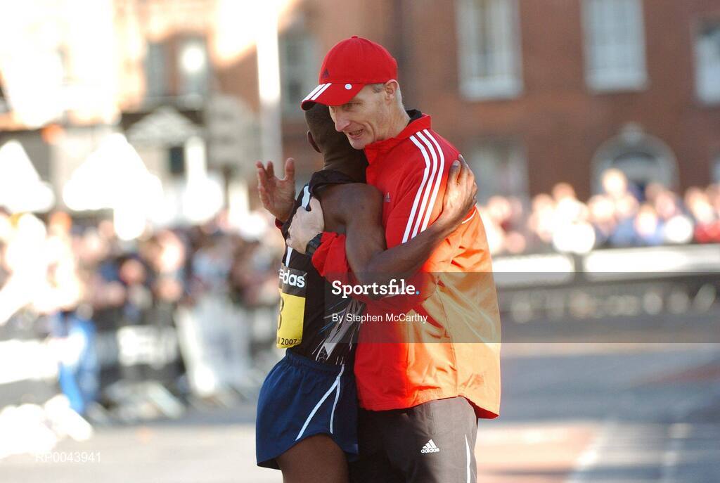 29 October 2007; Second placed Thomas Abyu, from Great Britain, is congratulated by race director Jim Aughney after the race. adidas Dublin City Marathon 2007, Merrion Square, Dublin. Picture credit: Stephen McCarthy / SPORTSFILE