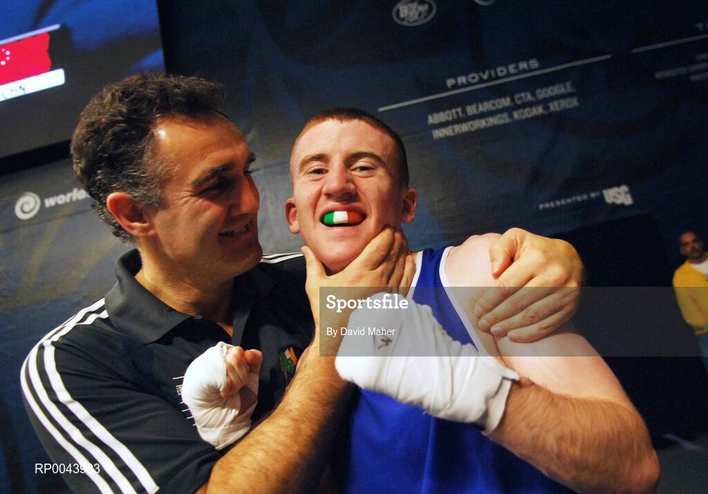 31 October 2007; Paddy Barnes, Belfast, Northern Ireland, celebrates at the end of the fight with head coach Billy Walsh his victory over Kenji Ohkubo, Japan, and qualifing for the Olympics in Beijing 2008. AIBA World Boxing Championships Chicago 2007, Light Fly 48 kg, Paddy Barnes.v.Kenji Ohkubo, University of Illinois, Chicago Pavilion, Chicago, USA. Picture credit: David Maher / SPORTSFILE