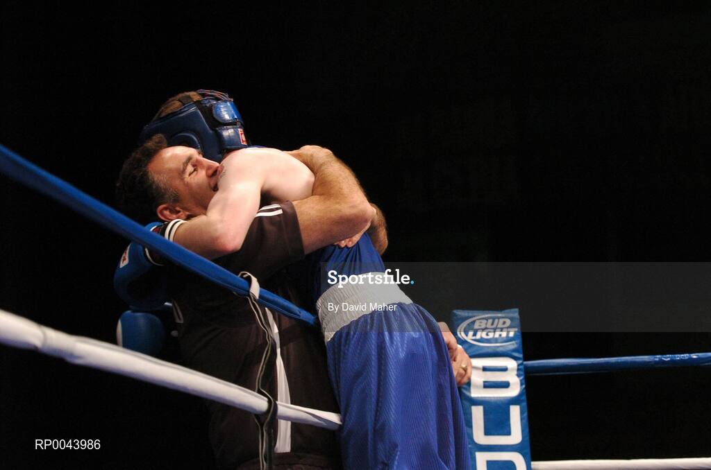 31 October 2007; Paddy Barnes, Belfast, Northern Ireland, celebrates at the end of the fight with head coach Billy Walsh after victory over Kenji Ohkubo, Japan, and qualifing for the Olympics in Beijing 2008. AIBA World Boxing Championships Chicago 2007, Light Fly 48 kg, Paddy Barnes.v.Kenji Ohkubo, University of Illinois, Chicago Pavilion, Chicago, USA. Picture credit: David Maher / SPORTSFILE