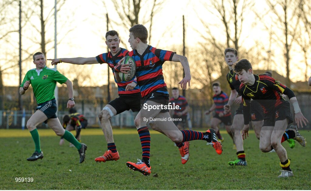 4 February 2015; Tom Harrington, St Munchin's College, supported by team-mate Shane Kelly, gets away from Maurice Noonan, Ardscoil Rís, on his way to scoring his side's second try. SEAT Munster Schools Junior Cup, Round 1, St Munchin's College v Ardscoil Rís. St Mary's RFC, Limerick. Picture credit: Diarmuid Greene / SPORTSFILE