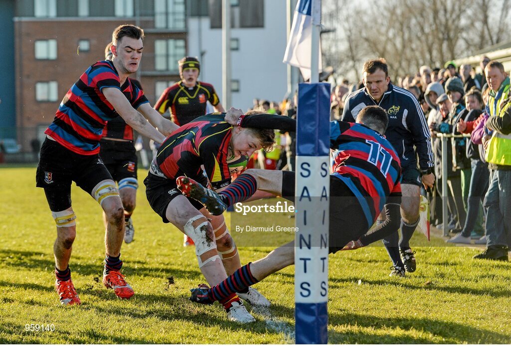 4 February 2015; Glen Clancy, Ardscoil Rís, is tackled by Shane Murphy, right, and Shane Kelly, left, St Munchin's College. SEAT Munster Schools Junior Cup, Round 1, St Munchin's College v Ardscoil Rís. St Mary's RFC, Limerick. Picture credit: Diarmuid Greene / SPORTSFILE
