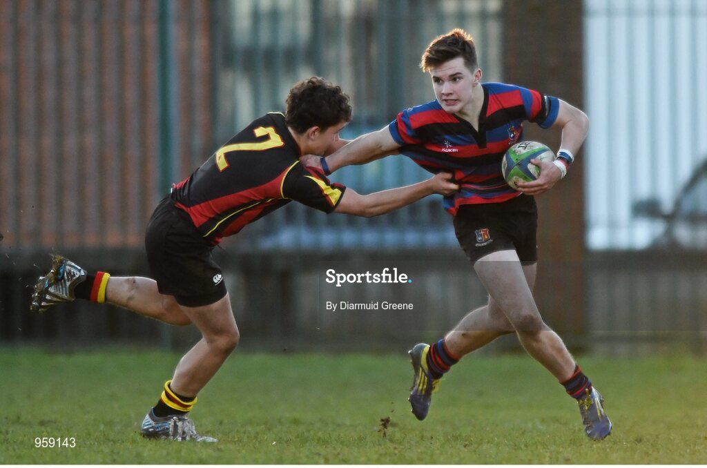 4 February 2015; Killian Markham, St Munchin's College, is tackled by Aaron Walshe, Ardscoil Rís. SEAT Munster Schools Junior Cup, Round 1, St Munchin's College v Ardscoil Rís. St Mary's RFC, Limerick. Picture credit: Diarmuid Greene / SPORTSFILE
