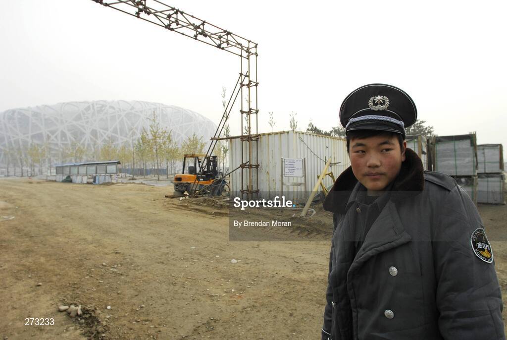 12 November 2007; A security guard near the National Stadium during preparations in Beijing ahead of the 2008 Summer Olympic Games. The 2008 Summer Olympics, officially known as the Games of the XXIX Olympiad, will be take place from the 8th August 2008 to 24th August 2008, at the Beijing National Stadium in Beijing, China. Beijing, China. Picture credit: Brendan Moran / SPORTSFILE