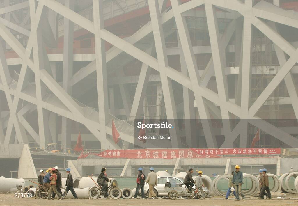 12 November 2007; Construction workers on the site of the National Stadium during preparations in Beijing ahead of the 2008 Summer Olympic Games. The 2008 Summer Olympics, officially known as the Games of the XXIX Olympiad, will be take place from the 8th August 2008 to 24th August 2008, at the Beijing National Stadium in Beijing, China. Beijing, China. Picture credit: Brendan Moran / SPORTSFILE *** Local Caption ***
