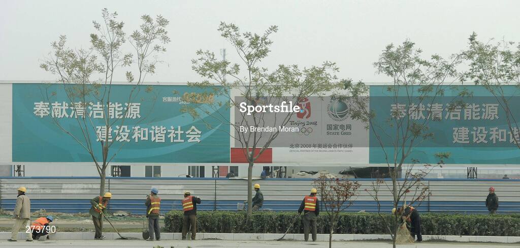 12 November 2007; Construction workers clean up the roads in the Olympic Green during preparations in Beijing ahead of the 2008 Summer Olympic Games. The 2008 Summer Olympics, officially known as the Games of the XXIX Olympiad, will be take place from the 8th August 2008 to 24th August 2008, at the Beijing National Stadium in Beijing, China. Beijing, China. Picture credit: Brendan Moran / SPORTSFILE *** Local Caption ***