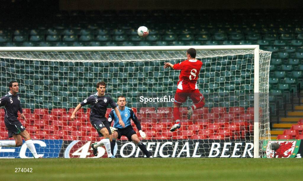 17 November 2007; Jason Koumas, Wales, beats Republic of Ireland players, left to right, John O'Shea, Kevin Kilbane, and Shay Given to score his side's first goal. 2008 European Championship Qualifier, Wales v Republic of Ireland, Millennium Stadium, Cardiff, Wales. Picture credit; David Maher / SPORTSFILE