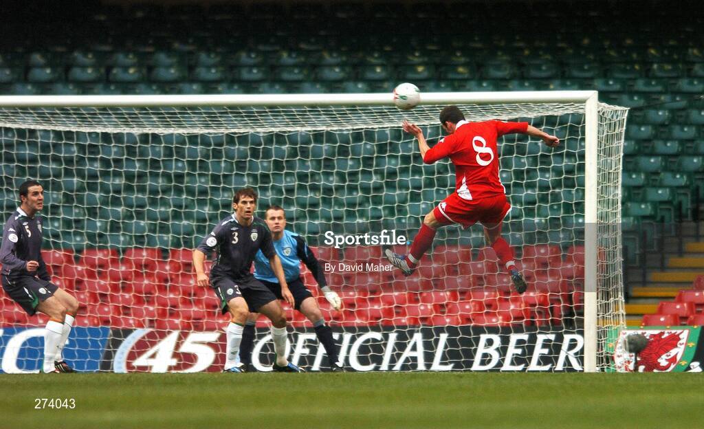 17 November 2007; Jason Koumas, Wales, beats Republic of Ireland players, left to right, John O'Shea, Kevin Kilbane, and Shay Given to score his side's first goal. 2008 European Championship Qualifier, Wales v Republic of Ireland, Millennium Stadium, Cardiff, Wales. Picture credit; David Maher / SPORTSFILE