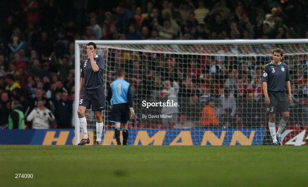 17 November 2007; Dejected Republic of Ireland players, John O'Shea, left, and Kevin Kilbane look on after Jason Koumas, Wales, scored his side's second goal. 2008 European Championship Qualifier, Wales v Republic of Ireland, Millennium Stadium, Cardiff, Wales. Picture credit; David Maher / SPORTSFILE