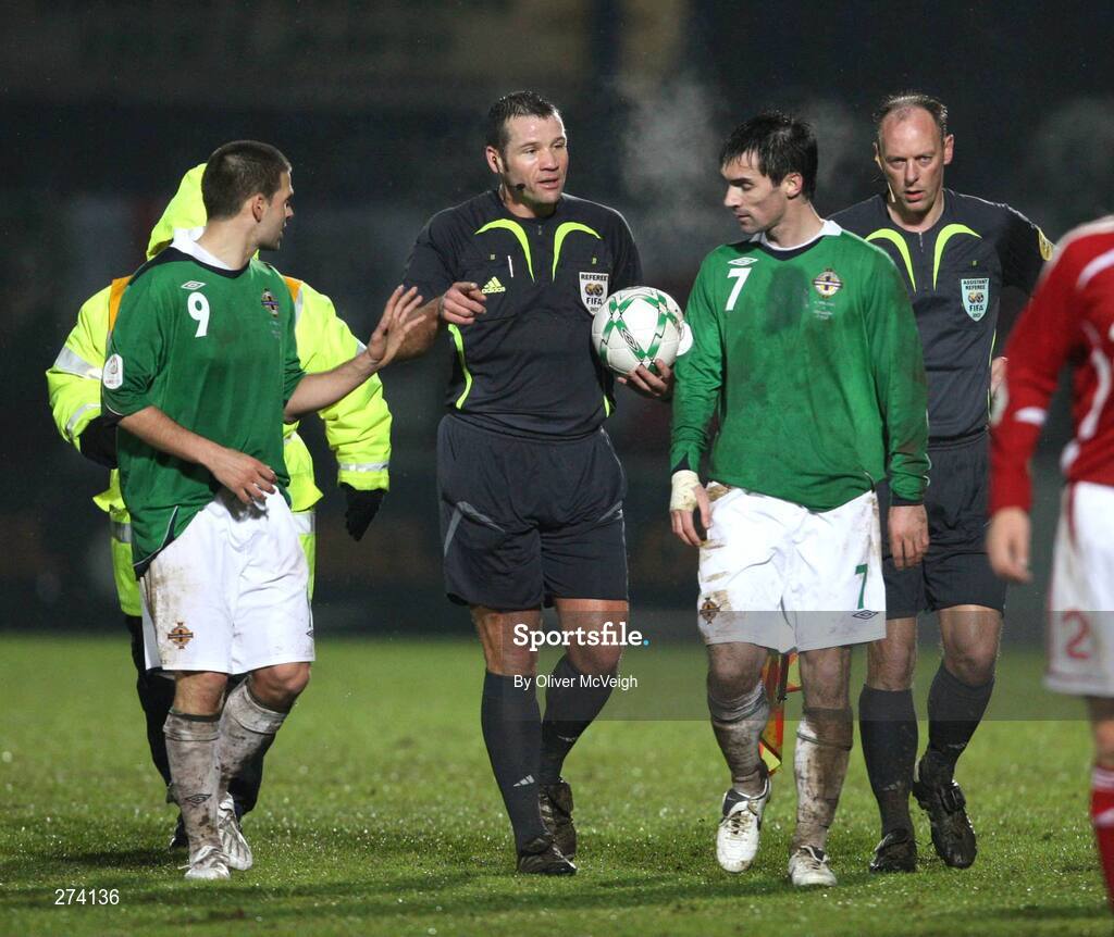 17 November 2007; Northern Ireland's David Healy, left, and Keith Gillespie confront referee Pieter Vink at half time. 2008 European Championship Qualifier, Northern Ireland v Denmark, Windsor Park, Belfast, Co. Antrim. Picture credit; Oliver McVeigh / SPORTSFILE