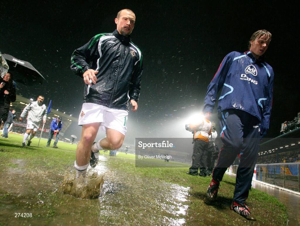 17 November 2007; Northern Ireland's Warren Feeney leaves the pitch after the warm up in atrocious foot conditions. 2008 European Championship Qualifier, Northern Ireland v Denmark, Windsor Park, Belfast, Co. Antrim. Picture credit; Oliver McVeigh / SPORTSFILE