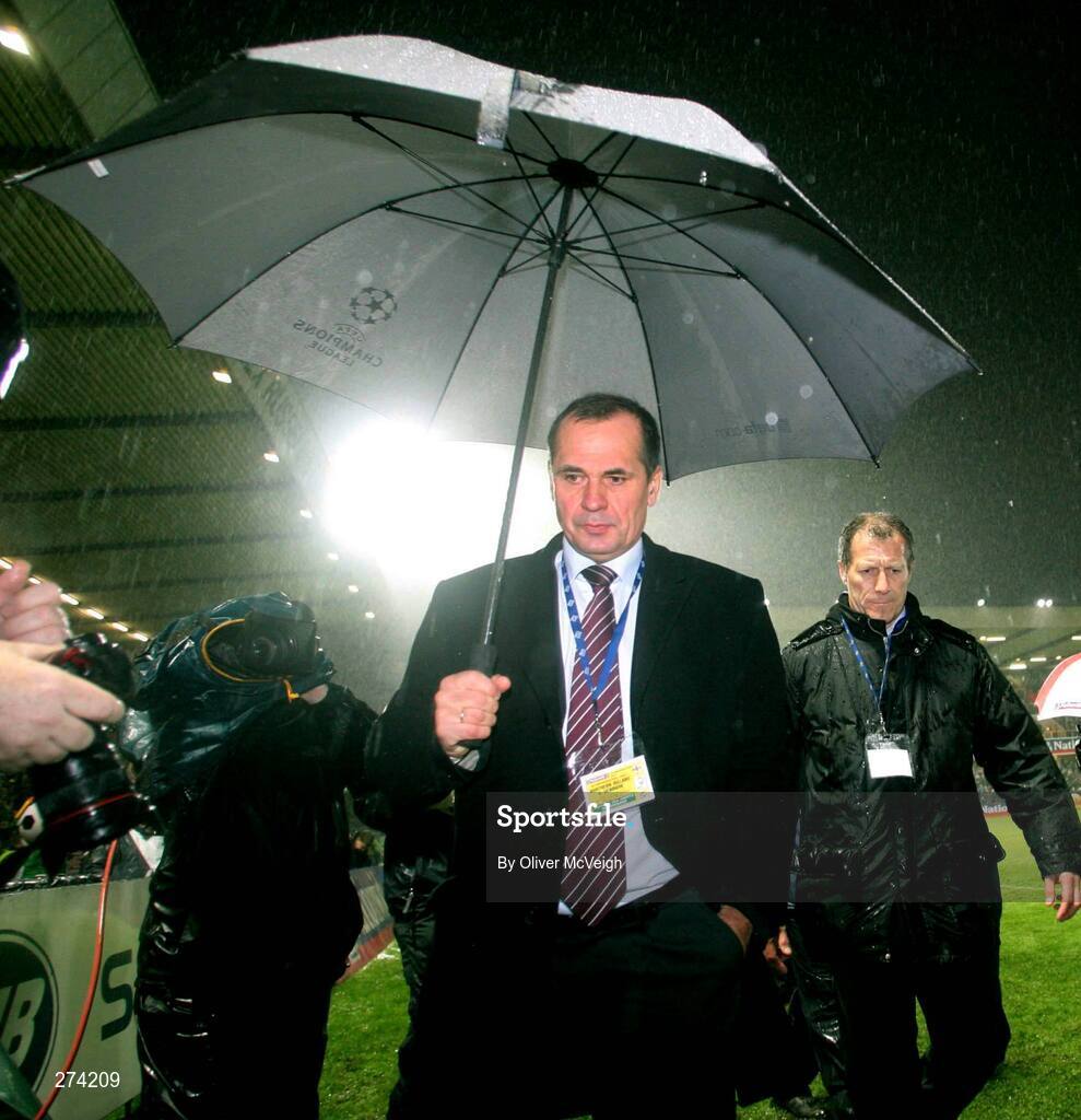 17 November 2007; Uefa delegate Fernand Meese, Belgium,  leaves the pitch after deciding that the match goes ahead. 2008 European Championship Qualifier, Northern Ireland v Denmark, Windsor Park, Belfast, Co. Antrim. Picture credit; Oliver McVeigh / SPORTSFILE