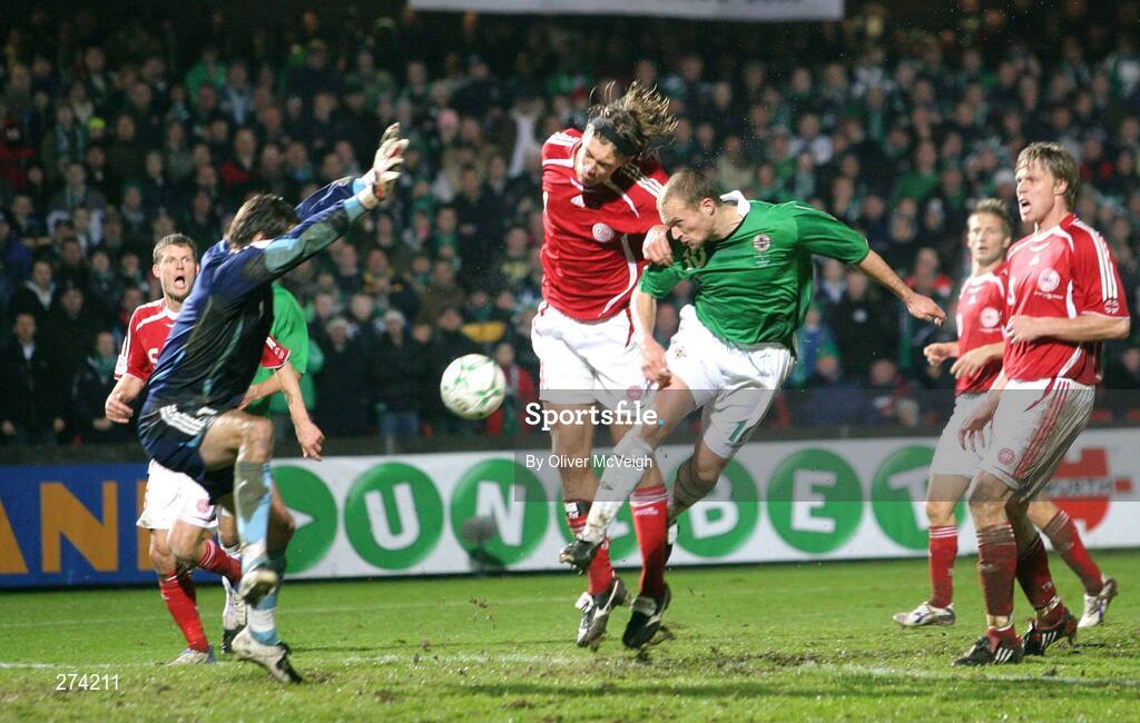 17 November 2007; Northern Ireland's Warren Feeney gets infront of Denmark defender Per Kroldrup to head the ball past goalkeeper Thomas Sorensen to score his side's equalising goal. 2008 European Championship Qualifier, Northern Ireland v Denmark, Windsor Park, Belfast, Co. Antrim. Picture credit; Oliver McVeigh / SPORTSFILE