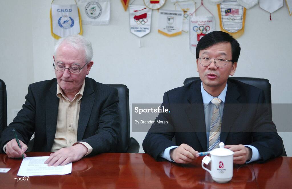 12 November 2007; Mr. Sun Weide, Deputy Director, Media and Communications Department, Beijing Organising Committee for the Games of the XXIX Olympiad, in the company of Jack McGouran, left, Media Officer, Olympic Council of Ireland, speaking to Irish journalists during preparations in Beijing ahead of the 2008 Summer Olympic Games. The 2008 Summer Olympics, officially known as the Games of the XXIX Olympiad, will be take place from the 8th August 2008 to 24th August 2008, at the Beijing National Stadium in Beijing, China. Beijing, China. Picture credit: Brendan Moran / SPORTSFILE *** Local Caption ***