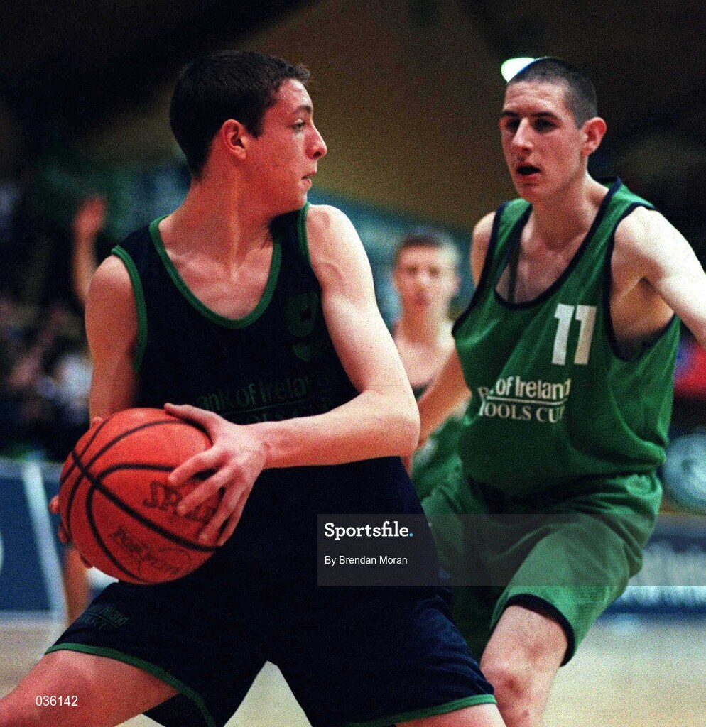 9 February 2000; Aidan O'Donnell of Carrick-On-Shannon CS in action against Christopher O'Sullivan Colaiste Mhuire Crosshaven during the Bank of Ireland Schools Cup Boys' C Final match between Colaiste Mhuire Crosshaven and Carrick-On-Shannon CS at National Basketball Arena in Tallaght, Dublin. Photo by Brendan Moran/Sportsfile