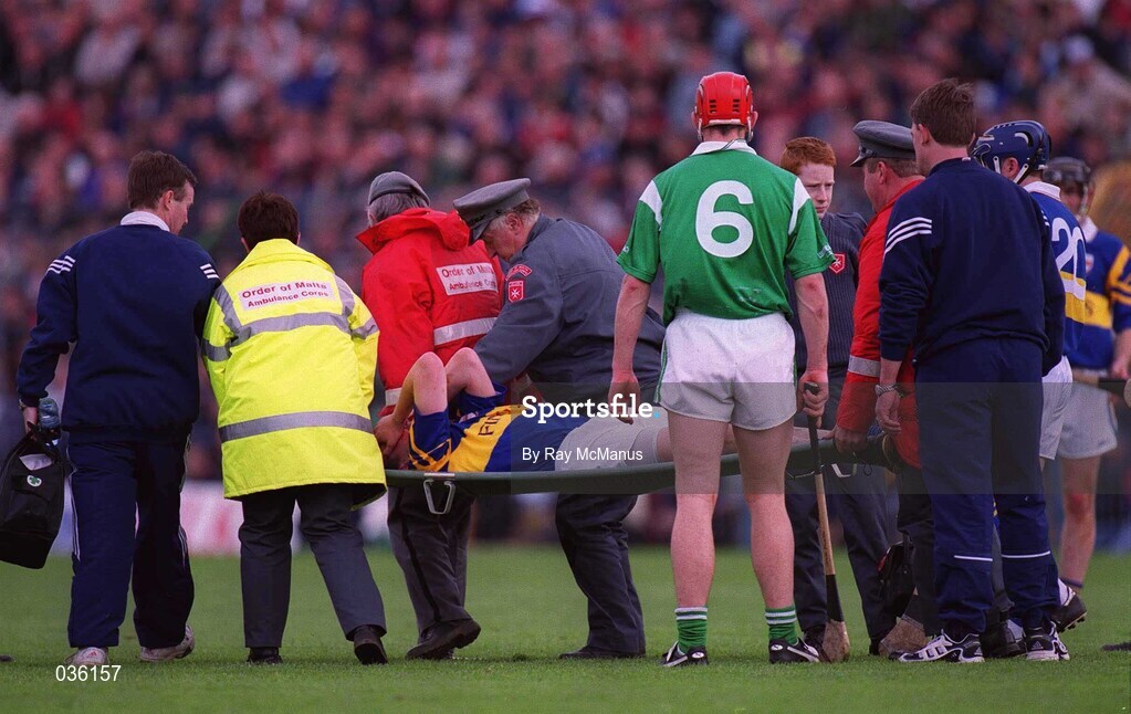 30 April 2000; Andy Moloney of Tipperary is stretchered after a collision with Ollie Moran of Limerick during the Church & General National Hurling League Division 1 Semi-Final match between Tipperary and Limerick at Semple Stadium in Thurles, Tipperary. Photo by Ray McManus/Sportsfile