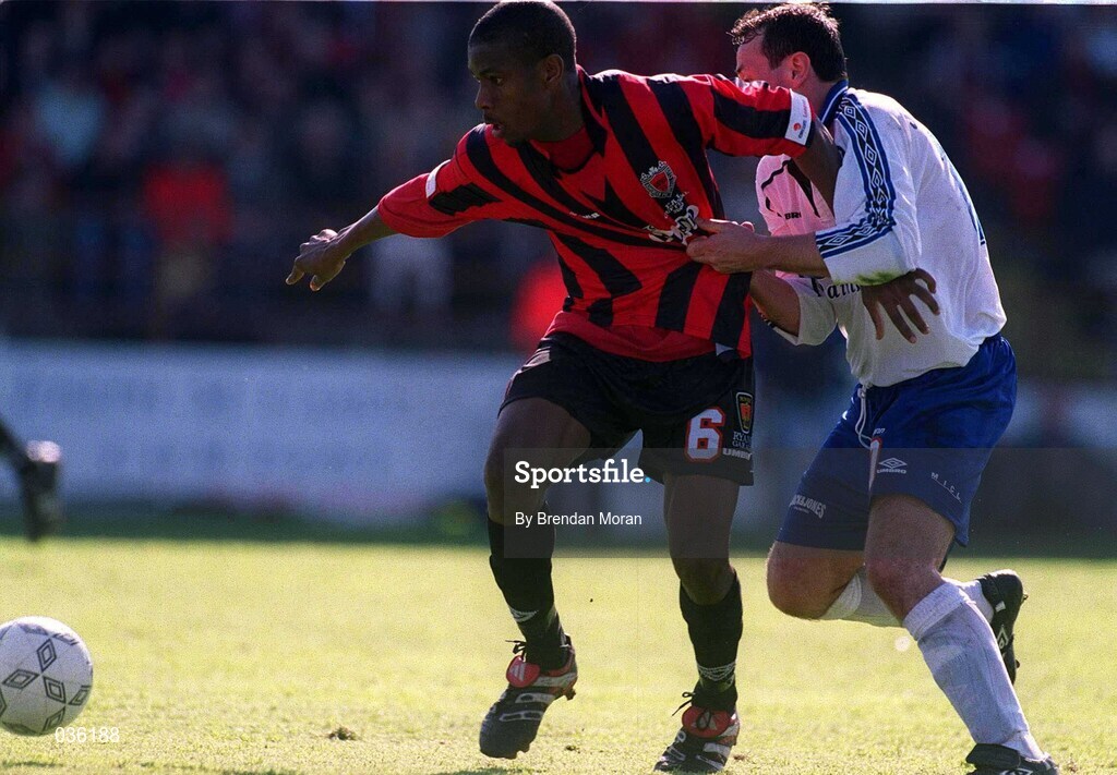 30 April 2000; Avery John of Bohemians in action against Declan Geoghegan of Shelbourne during the FAI Cup Final match between Shelbourne and Bohemians at Tolka Park in Dublin. Photo by Brendan Moran/Sportsfile