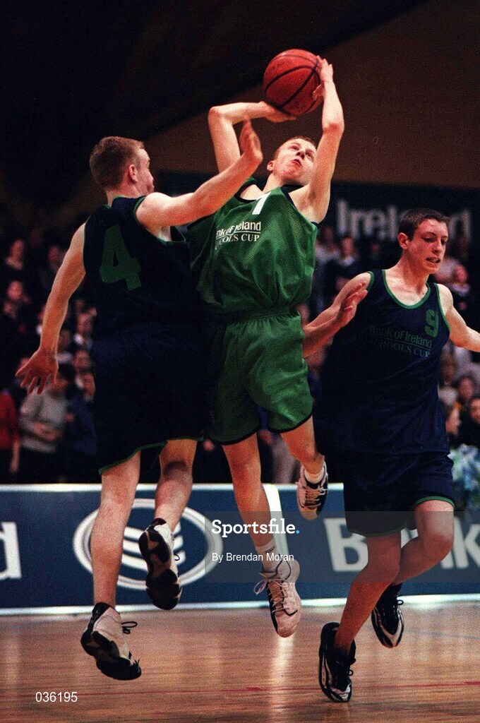 9 February 2000; Andrew Buckley of Colaiste Muire Crosshaven is tackled by Mark McEvoy, left, and Aidan O'Donnell of Carrick-on-Shannon CS during the Bank of Ireland Schools Cup Boys' C Final match between Colaiste Mhuire Crosshaven and Carrick-On-Shannon CS at National Basketball Arena in Tallaght, Dublin. Photo by Brendan Moran/Sportsfile