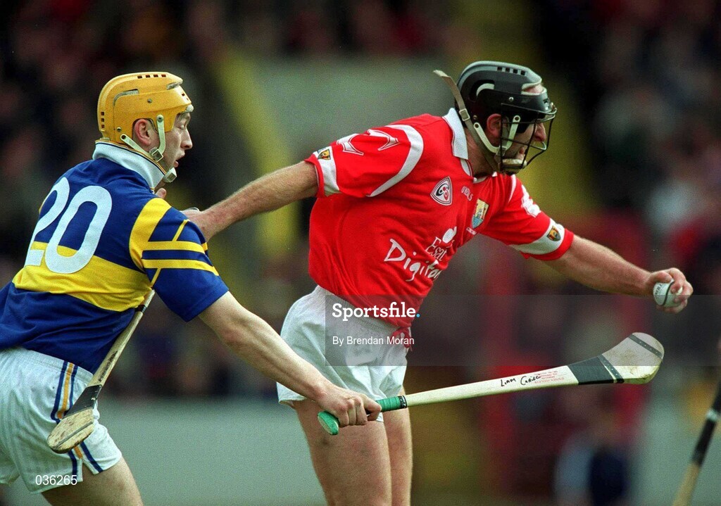 2 April 2000; Brian Corcoran of Cork in action against  Liam Cahill of Tipperary during the Church & General National Hurling League Division 1B match between Cork and Tipperary at Páirc Uí Chaoimh in Cork. Photo by Brendan Moran/Sportsfile