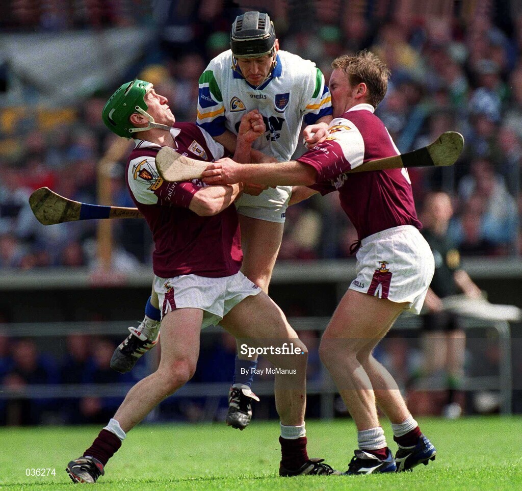 30 April 2000; Brian Henley of Waterford in action against Vennie Maher, left, and Finbar Gantley of Galway during the Church & General National Hurling League Division 1 Semi-Final match between Galway and Waterford at Semple Stadium in Thurles, Tipperary. Photo by Ray McManus/Sportsfile