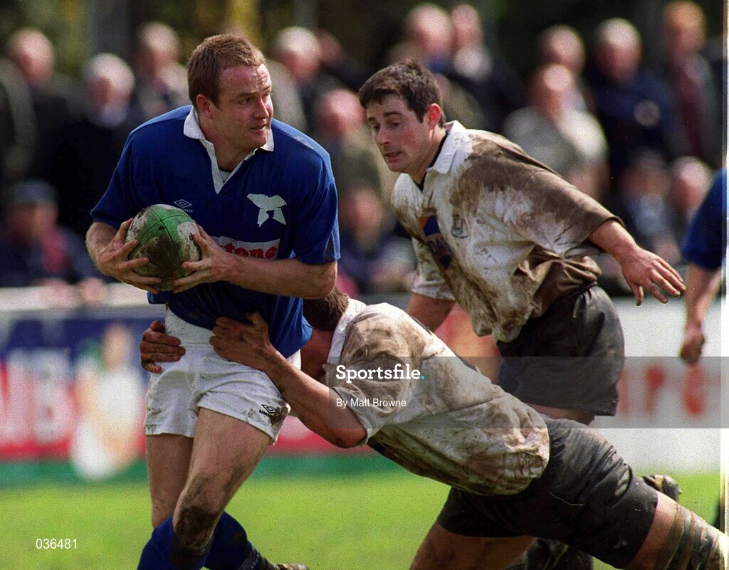 29 April 2000; Denis Hickie of St Mary's is tackled by  Donnacha O' Callaghan and Brian O' Meara of Cork Constitution during the AIB All-Ireland League Division 1 match between St Mary's and Cork Constitution at Templeville Road in Dublin. Photo by Matt Browne/Sportsfile