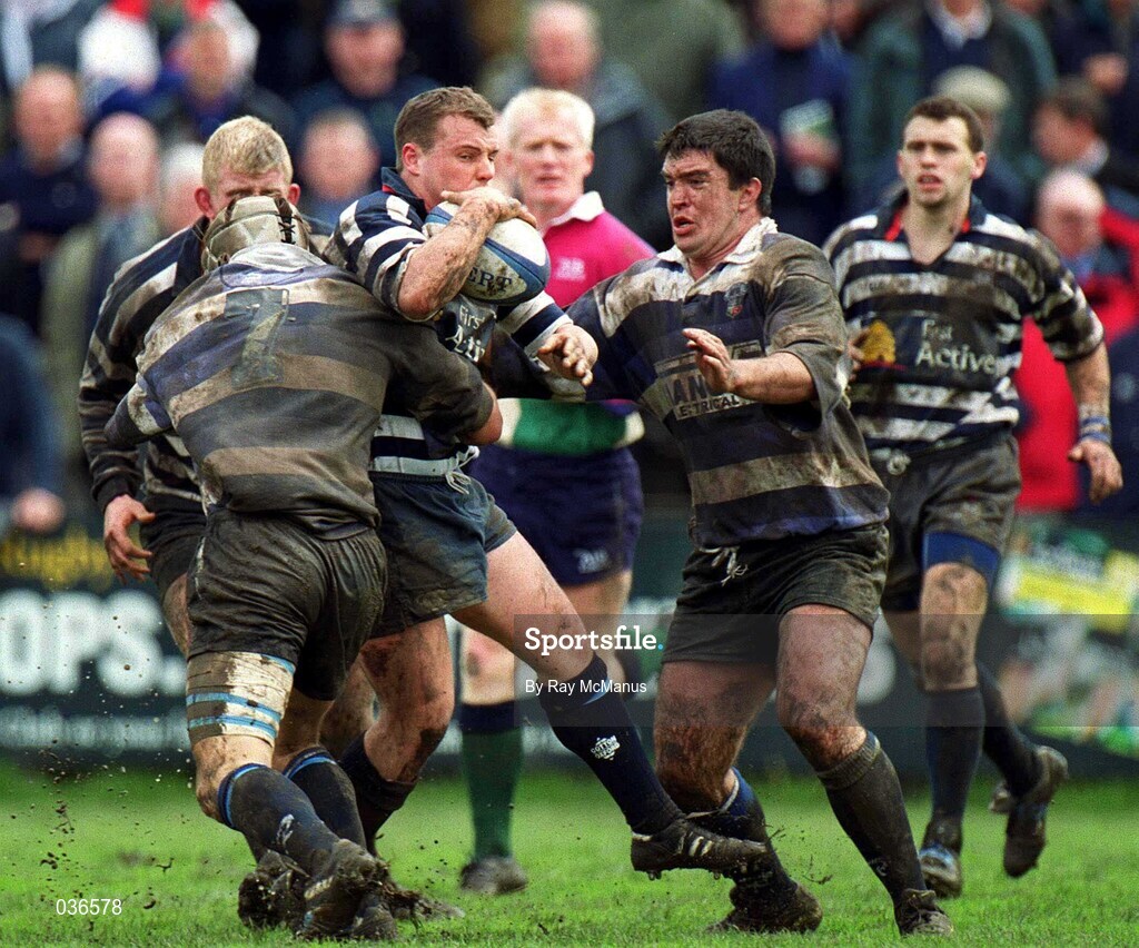 29 April 2000; Emmet Farrell of Blackrock College is tackled by Phil Glamuzina of Old Crescent during the AIB All-Ireland League Division 2 match between Blackrock College and Old Crescent at Stradbrook Road in Dublin. Photo by Ray McManus/Sportsfile