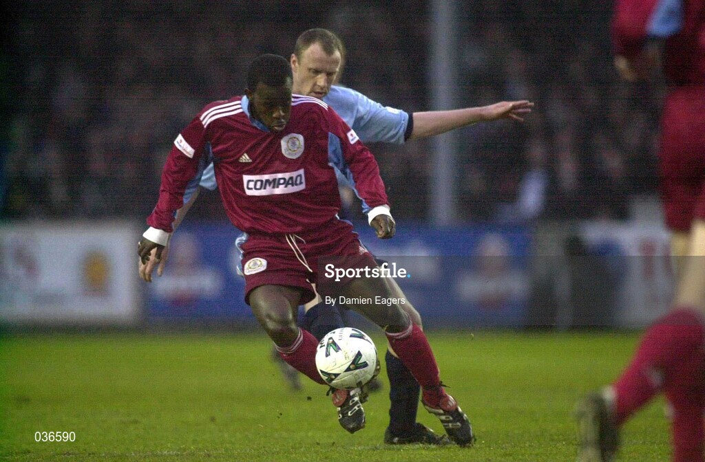 31 March 2000; Eric Lavine of Galway United is tackled by Tony McCarthy of Shelbourne during the FAI Cup Semi-Final match between Galway United and Shelbourne at Terryland Park in Galway. Photo by Damien Eagers/Sportsfile