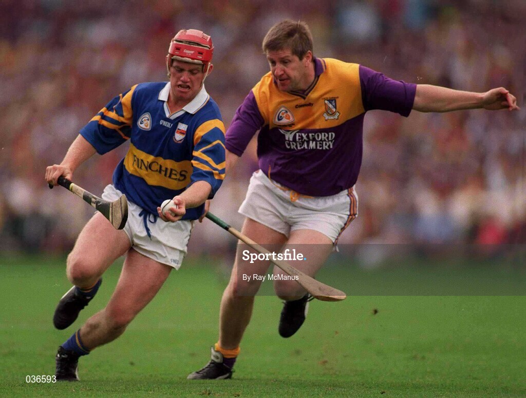 17 August 1997; Eugene O'Neill of Tipperary in action against Ger Cush of Wexford during the GAA All-Ireland Senior Hurling Championship Semi-Final match between Tipperary and Wexford at Croke Park in Dublin. Photo by Ray McManus/Sportsfile