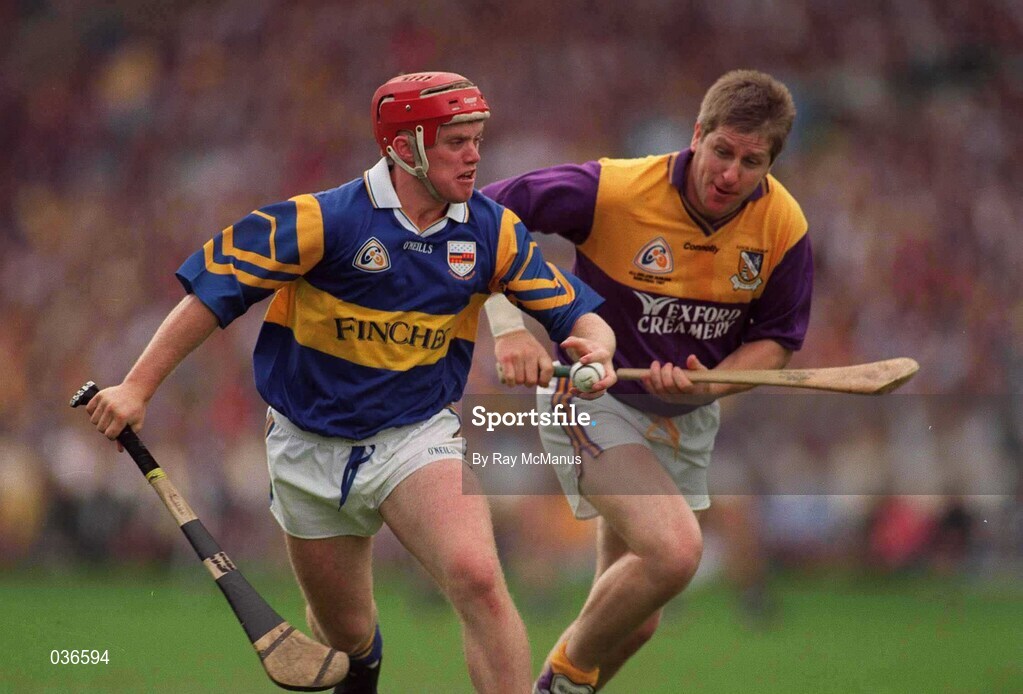 17 August 1997; Eugene O'Neill of Tipperary in action against Ger Cush of Wexford during the GAA All-Ireland Senior Hurling Championship Semi-Final match between Tipperary and Wexford at Croke Park in Dublin. Photo by Ray McManus/Sportsfile