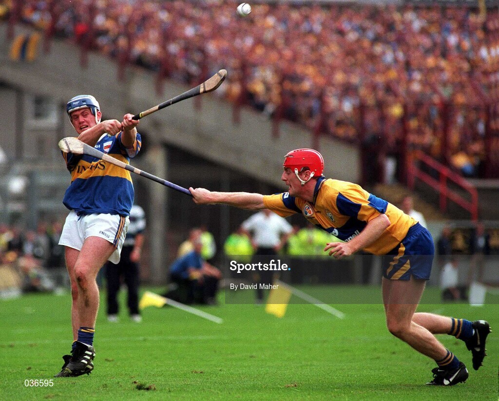 14 September 1997; Eugene O'Neill of Tipperary in action against against Brian Lohan of Clare during the Guinness All-Ireland Hurling Championship Final match between Clare and Tipperary at Croke Park in Dublin. Photo by David Maher/Sportsfile