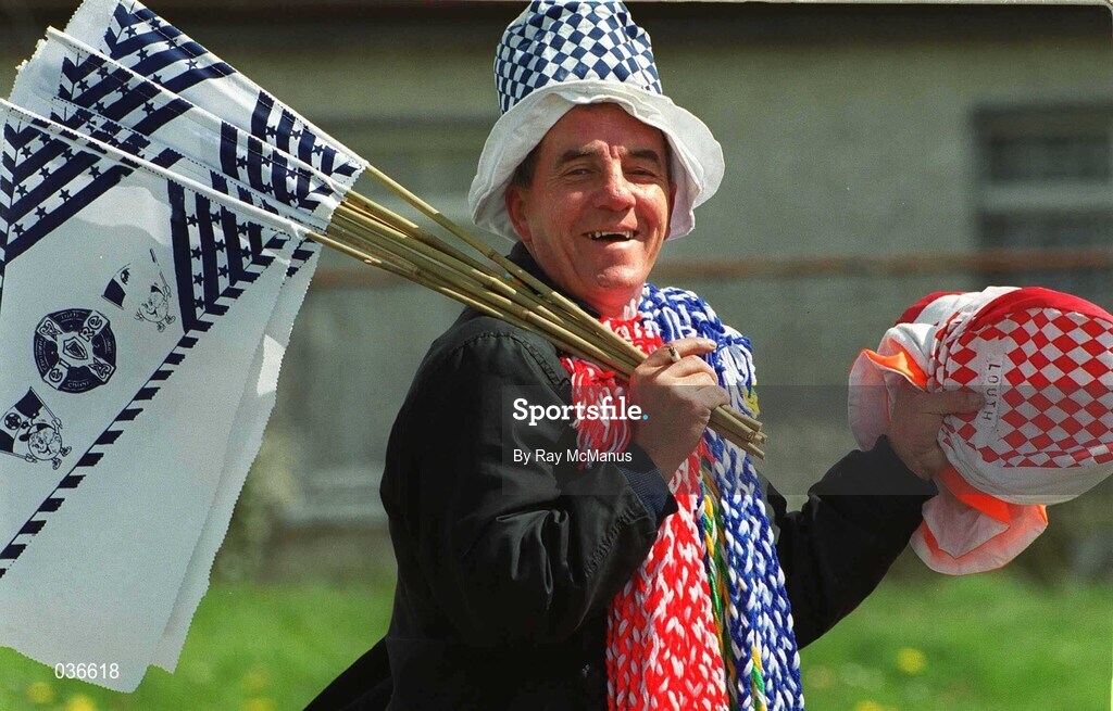 23 April 2000; A flag seller prior to the Church & General National Football League Division 2 Semi-Final match between Louth and Laois at Cusack Park in Mullingar, Westmeath. Photo by Ray McManus/Sportsfile