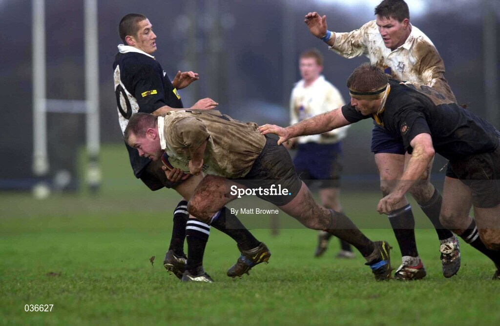12 February 2000; Frank Sheahan of Cork Constitution is tackled by Gary Longhwell of Ballymena during the AIB League Division 1 match between Ballymena and Cork Constitution at Eaton Park in Ballymena, Antrim. Photo by Matt Browne/Sportsfile