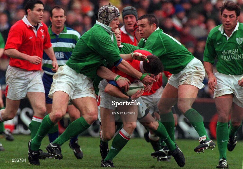 1 April 2000; Rhys Williams of Wales is tackled by Ireland players, from left, Malcolm O'Kelly, Brian O'Driscoll and Rob Henderson during the Lloyds TSB 6 Nations match between Ireland and Wales at Lansdowne Road in Dublin. Photo by Matt Browne/Sportsfile