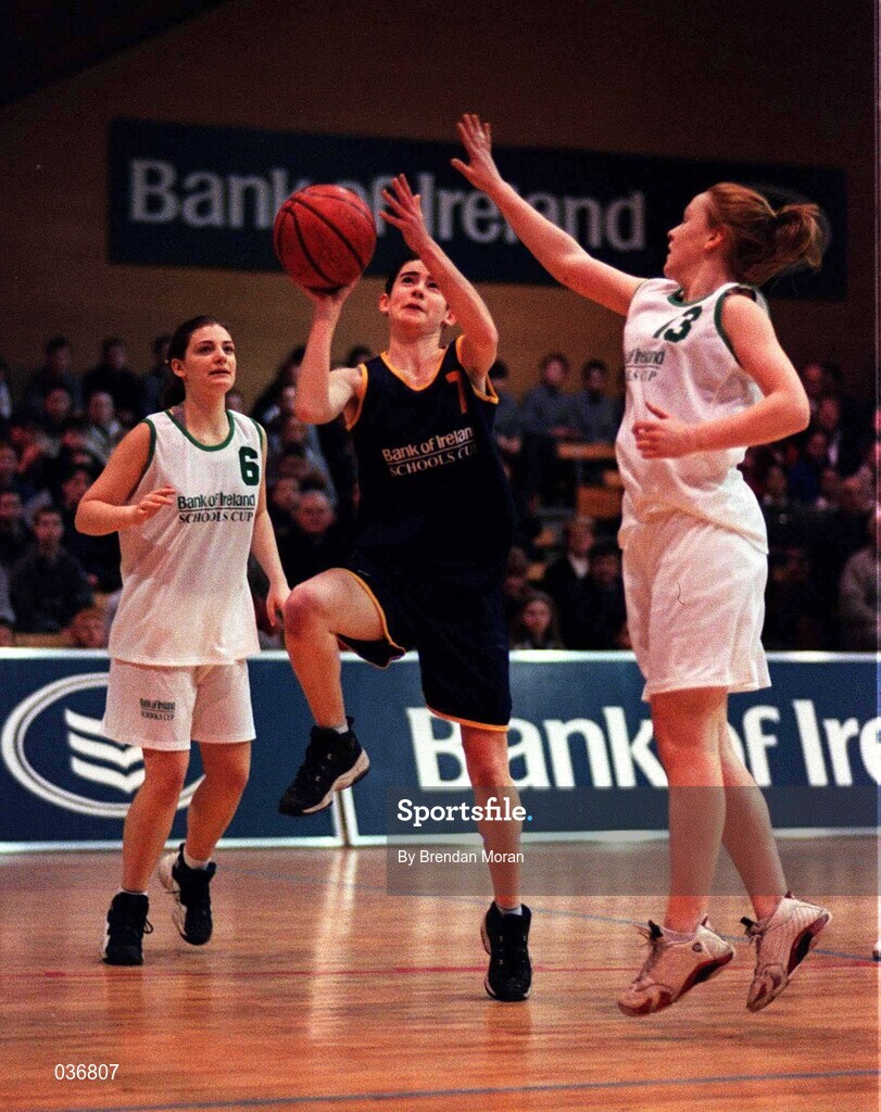 8 February 2000; Irene Codd of Scoil Ruain Killenaule in action against Neasa Cunniffe, left, and Catherine Shallow of Loreto Foxrock during the Bank of Ireland Schools Cup Girls' B Final match between Scoil Ruain Killenaule and Loreto Foxrock at National Basketball Arena in Tallaght, Dublin. Photo by Brendan Moran/Sportsfile