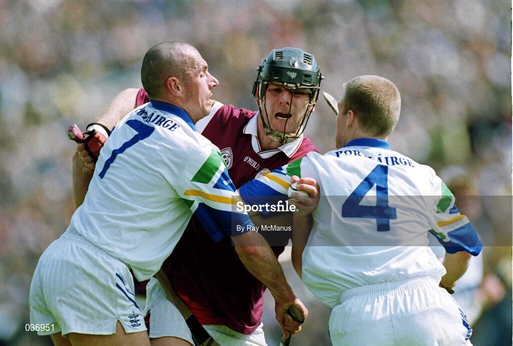 30 April 2000; Joe Rabbitte of Galway in action against Peter Queally, left, and Brian Flannery of Waterford during the Church & General National Hurling League Division 1 Semi-Final match between Galway and Waterford at Semple Stadium in Thurles, Tipperary. Photo by Ray McManus/Sportsfile